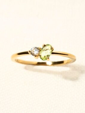 Gold Ring with Green Peridot and White Accent Stone